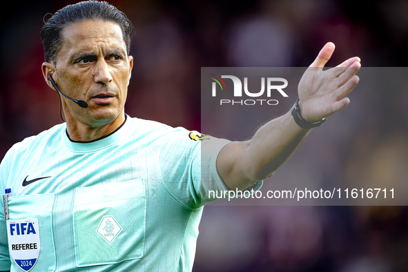 Referee Serdar Gozubuyuk officiates the match between Willem II and PSV at the Koning Willem II stadium for the Dutch Eredivisie season 2024...