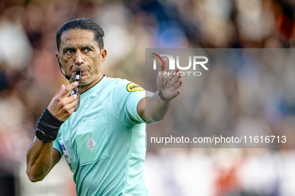 Referee Serdar Gozubuyuk officiates the match between Willem II and PSV at the Koning Willem II stadium for the Dutch Eredivisie season 2024...