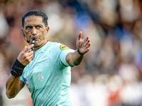 Referee Serdar Gozubuyuk officiates the match between Willem II and PSV at the Koning Willem II stadium for the Dutch Eredivisie season 2024...