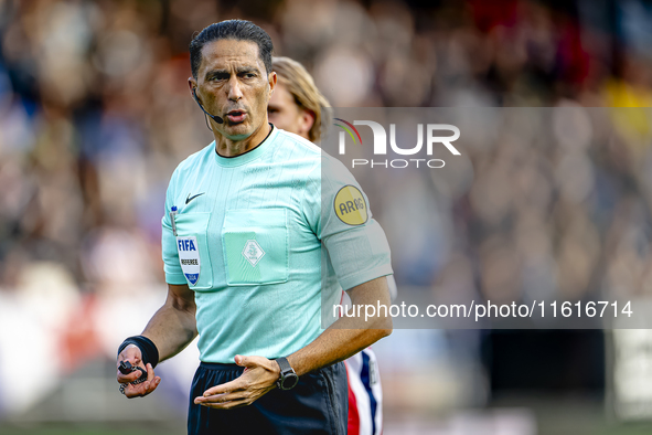 Referee Serdar Gozubuyuk officiates the match between Willem II and PSV at the Koning Willem II stadium for the Dutch Eredivisie season 2024...