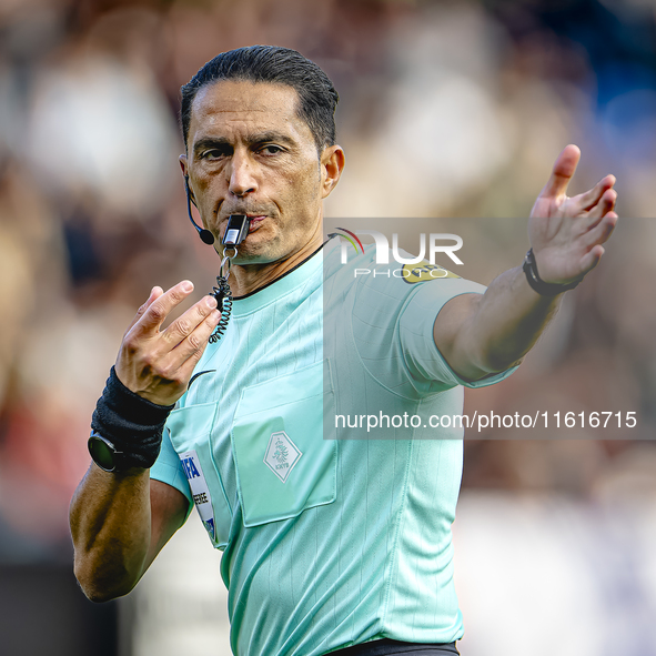 Referee Serdar Gozubuyuk officiates the match between Willem II and PSV at the Koning Willem II stadium for the Dutch Eredivisie season 2024...