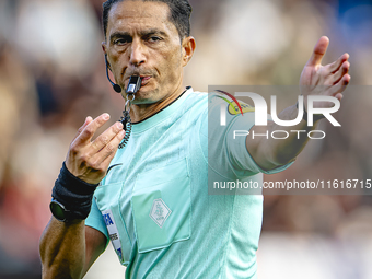 Referee Serdar Gozubuyuk officiates the match between Willem II and PSV at the Koning Willem II stadium for the Dutch Eredivisie season 2024...