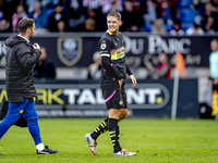 PSV Eindhoven midfielder Joey Veerman gets injured during the match between Willem II and PSV at the Koning Willem II stadium for the Dutch...