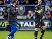 PSV Eindhoven midfielder Joey Veerman gets injured during the match between Willem II and PSV at the Koning Willem II stadium for the Dutch...