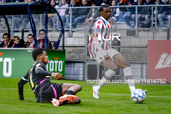 PSV Eindhoven defender Ryan Flamingo and Willem II forward Amar Fatah during the match Willem II vs. PSV at the Koning Willem II stadium for...