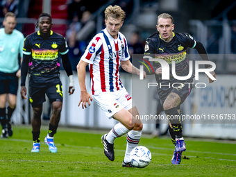 Willem II midfielder Cisse Sandra and PSV Eindhoven defender Rick Karsdorp during the match Willem II vs. PSV at the Koning Willem II stadiu...