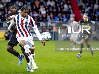 PSV Eindhoven forward Johan Bakayoko and Willem II forward Amar Fatah during the match Willem II vs. PSV at the Koning Willem II stadium for...