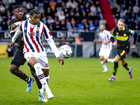 PSV Eindhoven forward Johan Bakayoko and Willem II forward Amar Fatah during the match Willem II vs. PSV at the Koning Willem II stadium for...