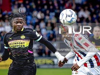 PSV Eindhoven forward Johan Bakayoko and Willem II forward Amar Fatah during the match Willem II vs. PSV at the Koning Willem II stadium for...