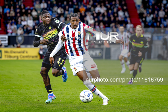 PSV Eindhoven forward Johan Bakayoko and Willem II forward Amar Fatah during the match Willem II vs. PSV at the Koning Willem II stadium for...