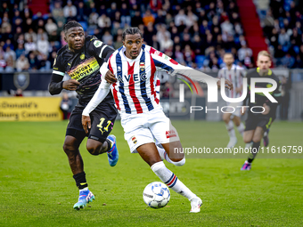 PSV Eindhoven forward Johan Bakayoko and Willem II forward Amar Fatah during the match Willem II vs. PSV at the Koning Willem II stadium for...