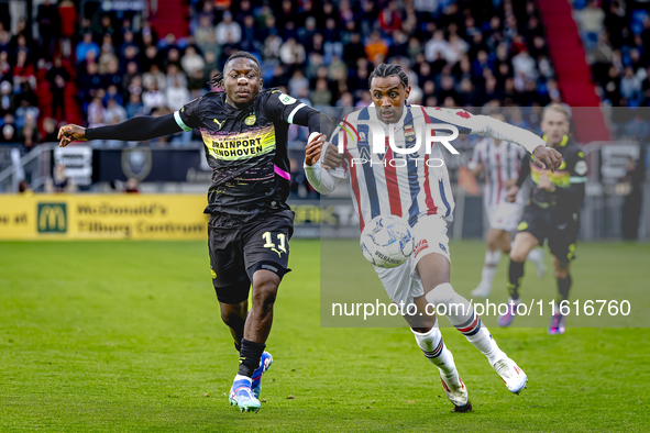 PSV Eindhoven forward Johan Bakayoko and Willem II forward Amar Fatah during the match Willem II vs. PSV at the Koning Willem II stadium for...