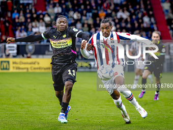 PSV Eindhoven forward Johan Bakayoko and Willem II forward Amar Fatah during the match Willem II vs. PSV at the Koning Willem II stadium for...