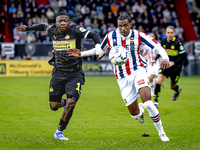 PSV Eindhoven forward Johan Bakayoko and Willem II forward Amar Fatah during the match Willem II vs. PSV at the Koning Willem II stadium for...