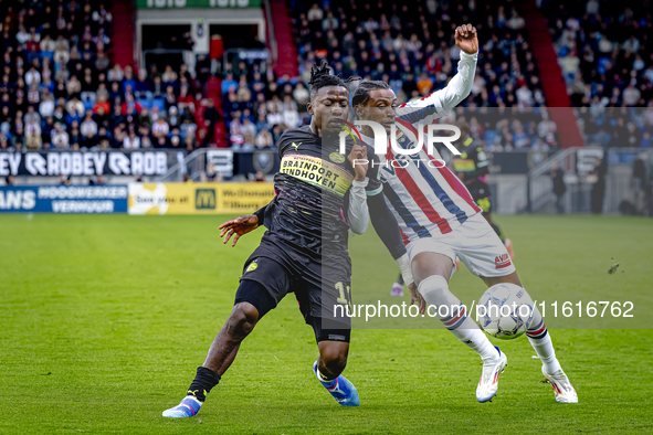 PSV Eindhoven forward Johan Bakayoko and Willem II forward Amar Fatah during the match Willem II vs. PSV at the Koning Willem II stadium for...