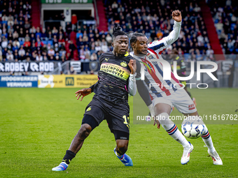 PSV Eindhoven forward Johan Bakayoko and Willem II forward Amar Fatah during the match Willem II vs. PSV at the Koning Willem II stadium for...