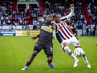 PSV Eindhoven forward Johan Bakayoko and Willem II forward Amar Fatah during the match Willem II vs. PSV at the Koning Willem II stadium for...