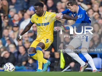 Marc Guehi #6 of Crystal Palace F.C. possesses the ball during the Premier League match between Everton and Crystal Palace at Goodison Park...