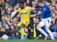 Marc Guehi #6 of Crystal Palace F.C. possesses the ball during the Premier League match between Everton and Crystal Palace at Goodison Park...