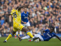 Jeffrey Schlupp #15 of Crystal Palace F.C. is tackled by the opponent during the Premier League match between Everton and Crystal Palace at...