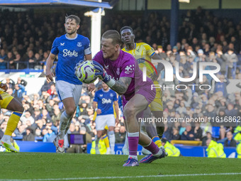 Jordan Pickford #1 (GK) of Everton F.C. makes a save during the Premier League match between Everton and Crystal Palace at Goodison Park in...