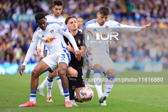 Junior Firpo (Leeds United) freezes out Jack Rudoni (Coventry City) with Joel Piroe (Leeds United) during the Sky Bet Championship match bet...