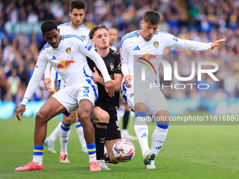 Junior Firpo (Leeds United) freezes out Jack Rudoni (Coventry City) with Joel Piroe (Leeds United) during the Sky Bet Championship match bet...