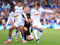 Junior Firpo (Leeds United) freezes out Jack Rudoni (Coventry City) with Joel Piroe (Leeds United) during the Sky Bet Championship match bet...