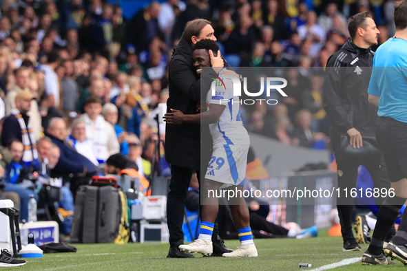 Daniel Farke, Leeds United manager, embraces Wilfried Gnonto (Leeds United) during the Sky Bet Championship match between Leeds United and C...