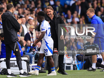 Daniel Farke, Leeds United manager, embraces Wilfried Gnonto (Leeds United) during the Sky Bet Championship match between Leeds United and C...