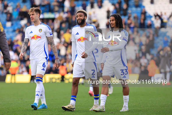 Jayden Bogle (Leeds United) stands flanked by Joe Rodon (Leeds United) and Isaac Schmidt (Leeds United) after the Sky Bet Championship match...