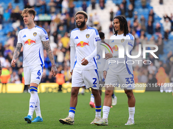 Jayden Bogle (Leeds United) stands flanked by Joe Rodon (Leeds United) and Isaac Schmidt (Leeds United) after the Sky Bet Championship match...