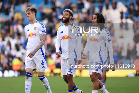 Jayden Bogle (Leeds United) stands flanked by Joe Rodon (Leeds United) and Isaac Schmidt (Leeds United) after the Sky Bet Championship match...