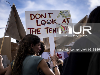 Thousands of people take to the streets in Lisbon, Portugal, on October 28, 2023, to demand better living conditions and lower housing price...