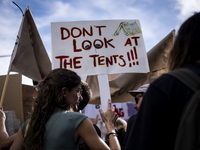 Thousands of people take to the streets in Lisbon, Portugal, on October 28, 2023, to demand better living conditions and lower housing price...