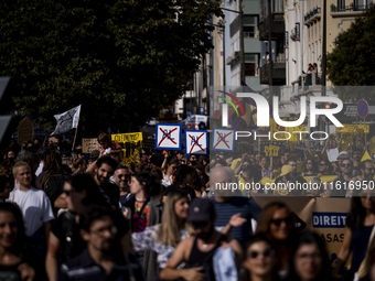 Thousands of people take to the streets in Lisbon, Portugal, on October 28, 2023, to demand better living conditions and lower housing price...