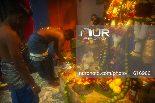 Tamil Hindus from the Shri Muniswaren Temple in Medan Polonia, North Sumatra, Indonesia, commemorate Lord Muniswaren's birthday by beating d...