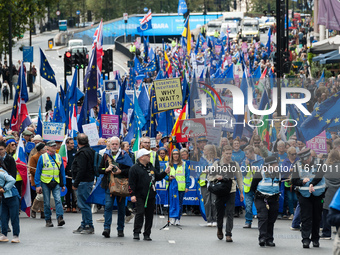 LONDON, UNITED KINGDOM - SEPTEMBER 28, 2024: Thousands of pro-EU demonstrators march in central London calling for the UK to rejoin the Euro...