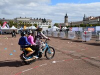 Several people test bikes during the first bikes Lyon festival in Lyon, France, on September 28, 2024. (