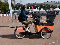 Several people test bikes during the first bikes Lyon festival in Lyon, France, on September 28, 2024. (