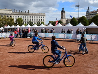 Several people test bikes during the first bikes Lyon festival in Lyon, France, on September 28, 2024. (