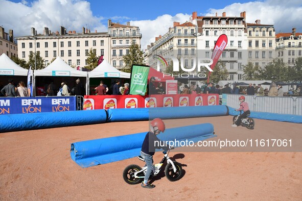 Several people test bikes during the first bikes Lyon festival in Lyon, France, on September 28, 2024. 