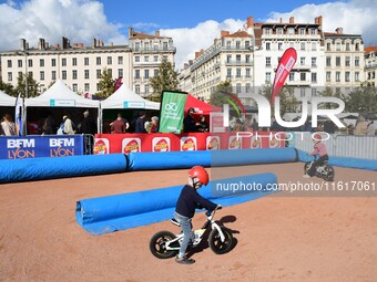 Several people test bikes during the first bikes Lyon festival in Lyon, France, on September 28, 2024. (