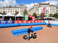 Several people test bikes during the first bikes Lyon festival in Lyon, France, on September 28, 2024. (