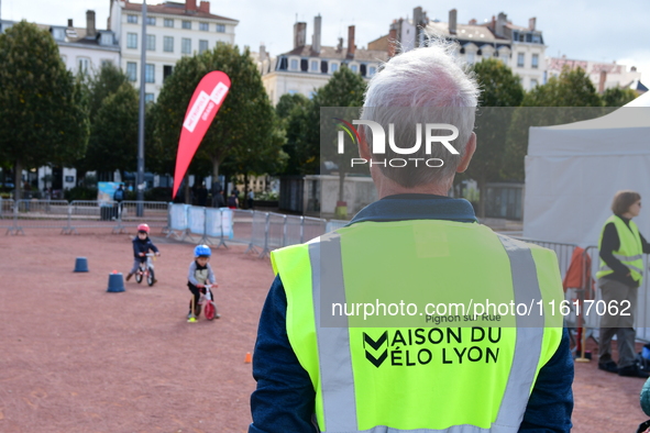 Several people test bikes during the first bikes Lyon festival in Lyon, France, on September 28, 2024. 