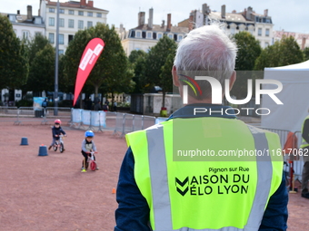 Several people test bikes during the first bikes Lyon festival in Lyon, France, on September 28, 2024. (