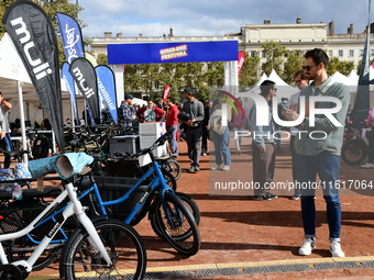 Several people test bikes during the first bikes Lyon festival in Lyon, France, on September 28, 2024. (