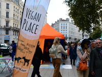 Several people visit the associative village organized by L214 in Lyon, France, on September 28, 2024. (