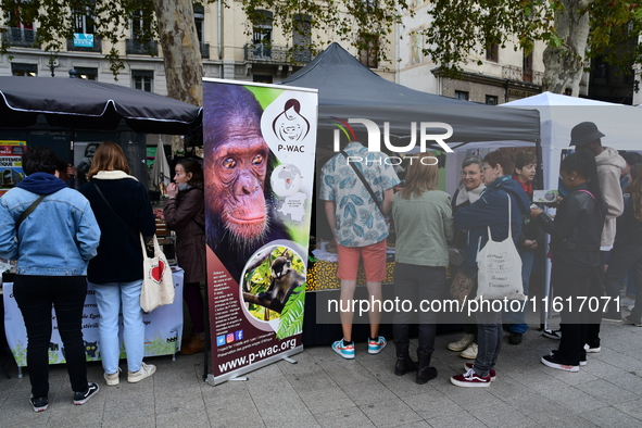 Several people visit the associative village organized by L214 in Lyon, France, on September 28, 2024. 