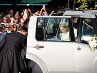 Princess Theodora Glucksburg of Greece and her brother Pavlos, former Crown Prince of Greece, arrive for her wedding with Matthew Jeremiah K...